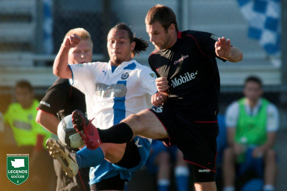 Action from a 2010 PDL match between Crossfire (black) and Kitsap Pumas. (Courtesy USL)