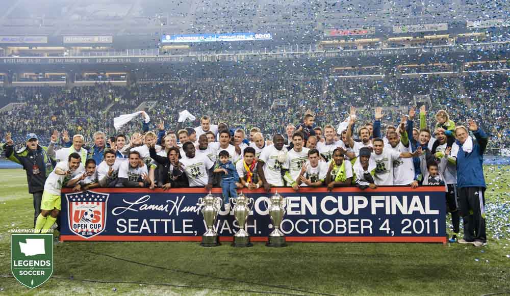 Sounders FC players and staff celebrate becoming the first club in 42 years to win three consecutive U.S. Open Cups after a 2-0 victory over Chicago. (Sounders FC photo)