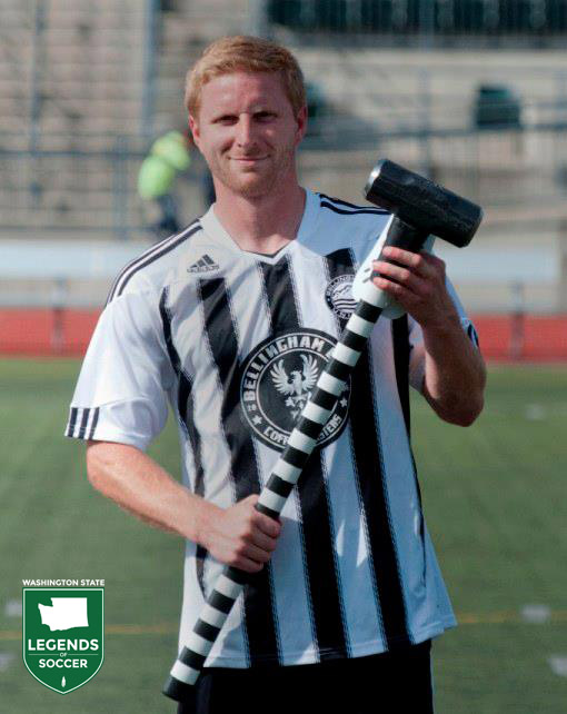 Chris Jepson holding the sledgehammer given to Bellingham United's player of the match. (Courtesy Bellingham United)