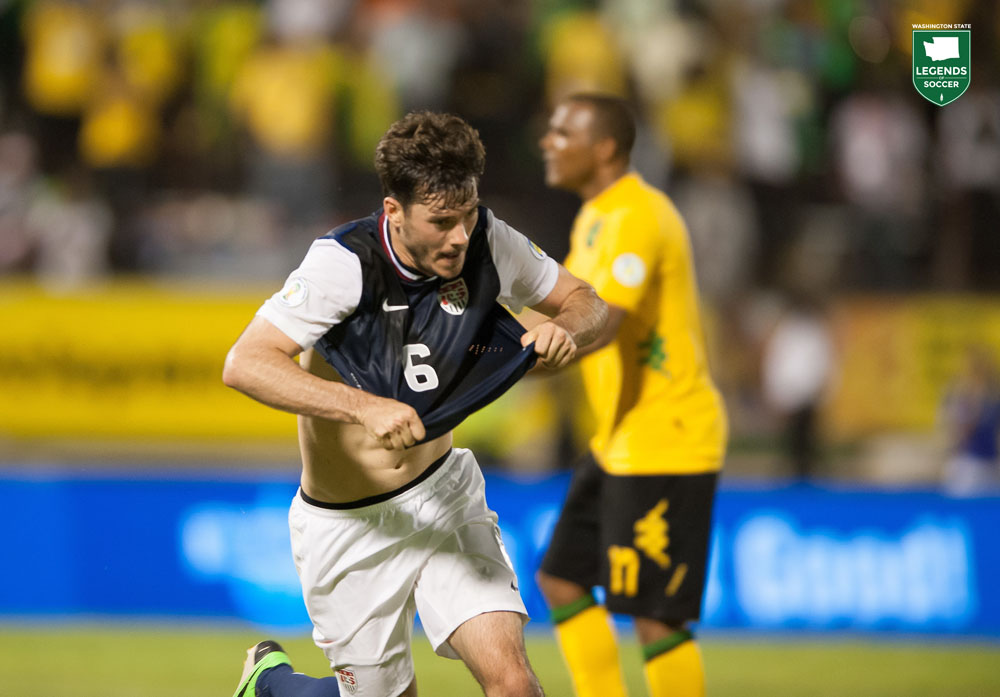Sounders veteran Brad Evans prepares to pull off his shirt in celebration of scoring the USMNT winning goal at Jamaica. (Courtesy John Todd / ISI Photos)