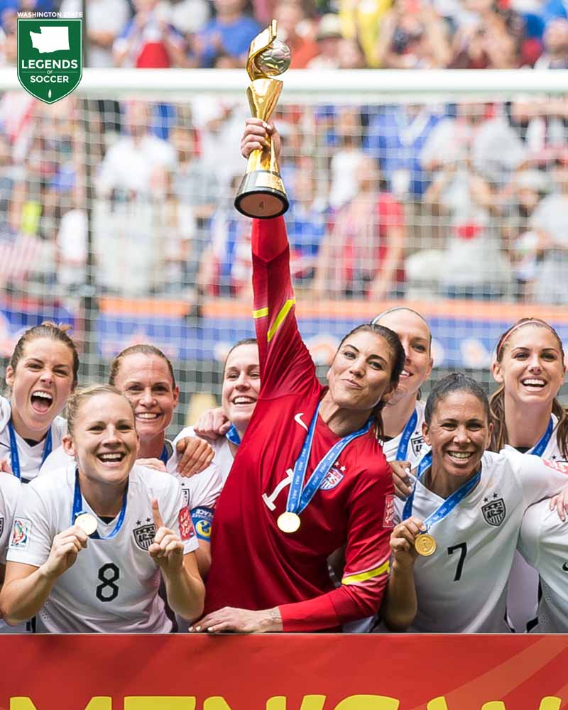 Hope Solo raises the World Cup trophy following a 5-2 victory by the United States over Japan at B.C. Place. (Courtesy Steven Limentani/ISI Photos)