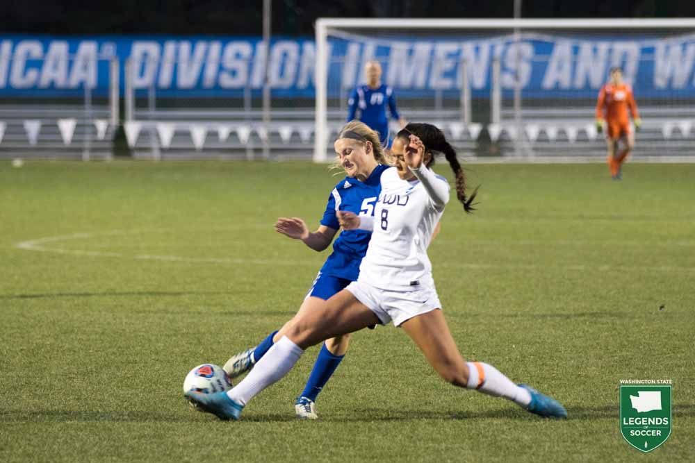 Division II Player of the Year Sierra Shugarts battles for possession in Western Washington's 3-2 championship win over Grand Valley State.