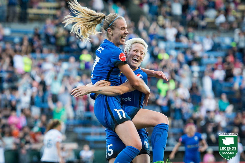 Seattle Reign's Beverly Yanez (left) and Megan Rapinoe celebrate scoring in a 5-4 home win over Sky Blue. Rapinoe had a hat trick and Yanez also scored. (Courtesy Seattle Reign)