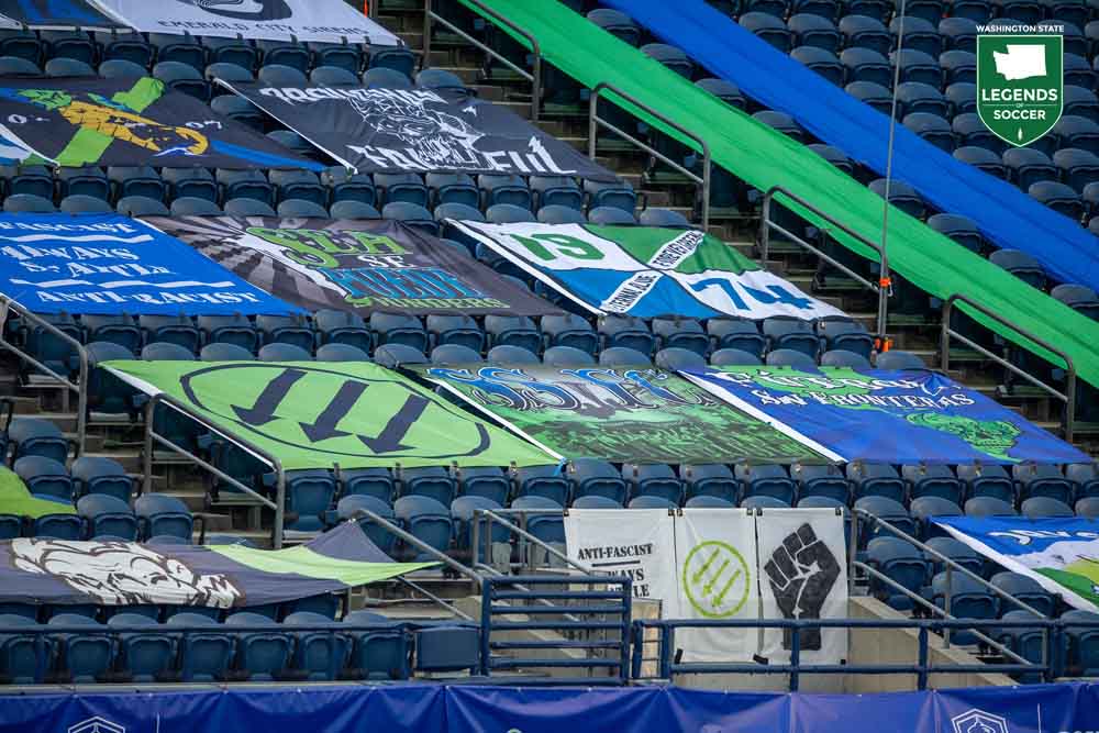 Instead of raucous supporters, only silent flags decorated the Brougham End for Sounders home matches during the final months of the 2020 season. (Courtesy Lindsey Wasson/Sounders FC)