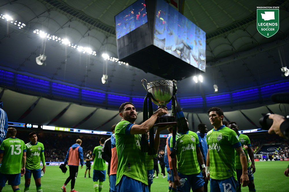 Fredy Montero's (r) penalty kick was enough for the Sounders to earn a 1-1 draw at Vancouver to retain the Cascadia Cup, which is lifted by Cristian Roldan. (Courtesy Sounders FC/Jane Gershovich)