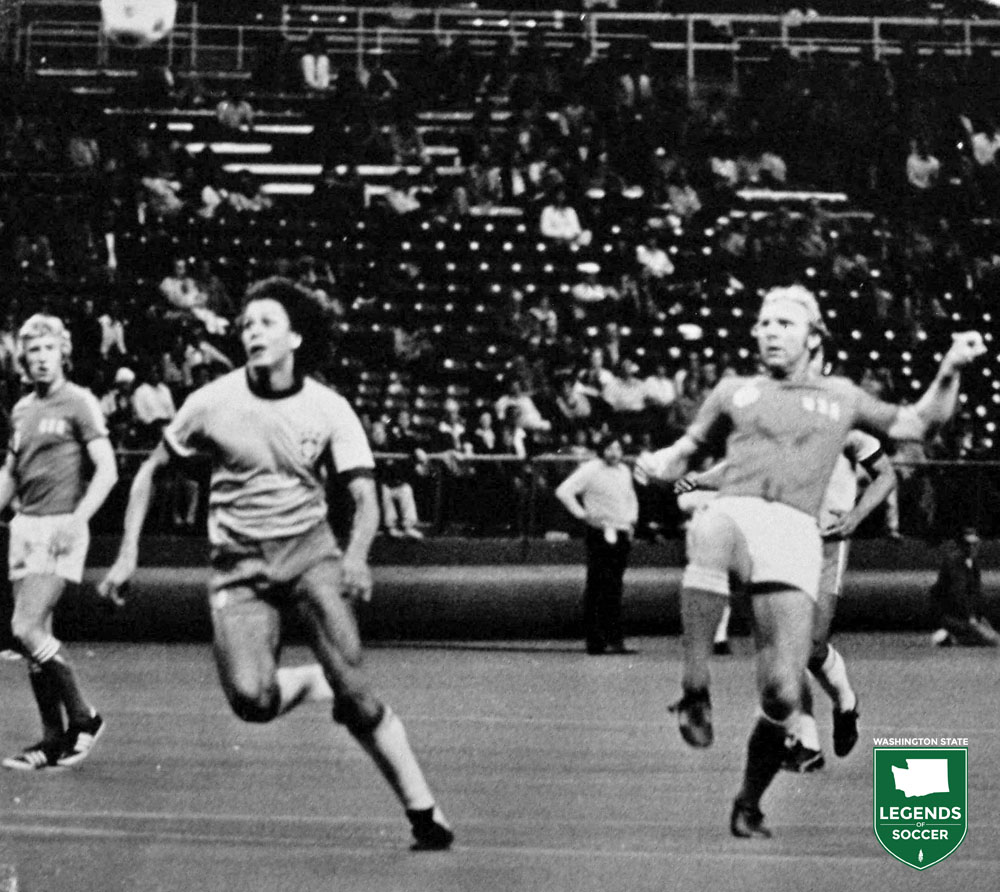 Team America's Bobby Moore, far right, pumps the ball upfield against Brazil in a Bicentennial Cup match in the Kingdome. (Frank MacDonald Collection)