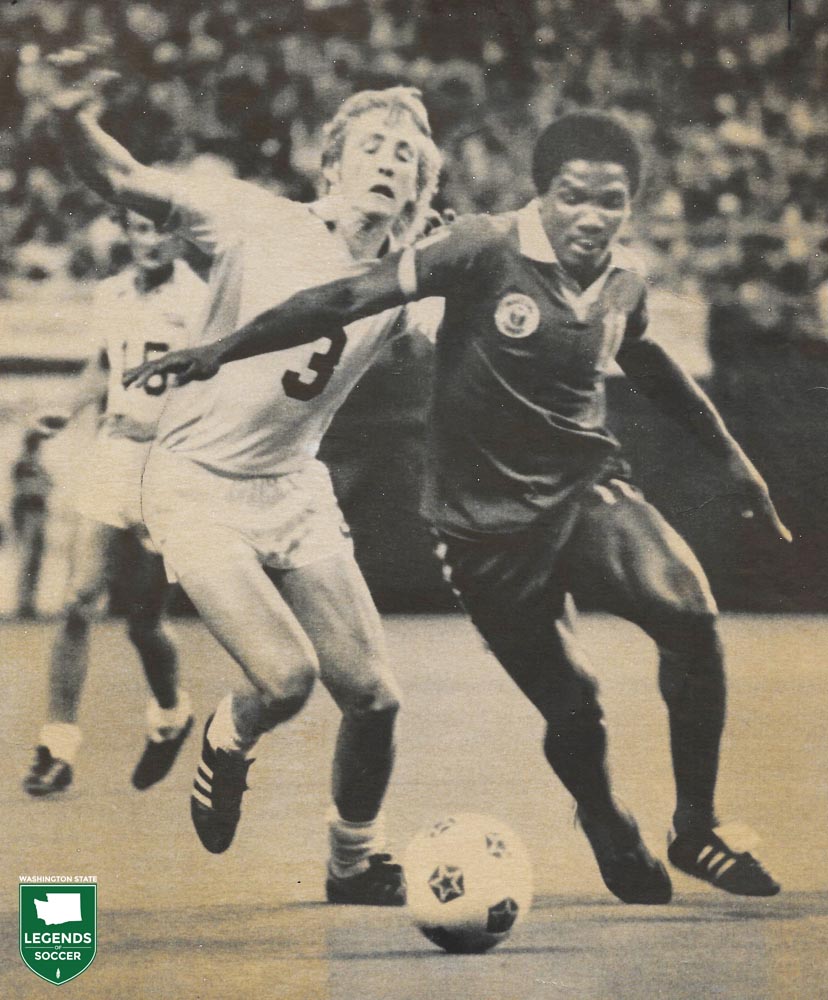 Jimmy McAlister of the Sounders is held off the ball by Portland's Elson Seale. (Frank MacDonald Collection)