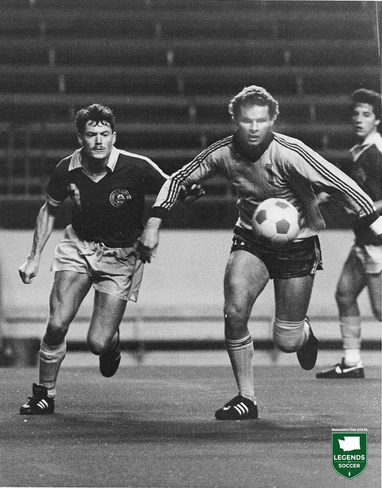 Gerard McGlynn chases a loose ball for Seattle Pacific vs. Washington. (Courtesy Seattle Pacific University)