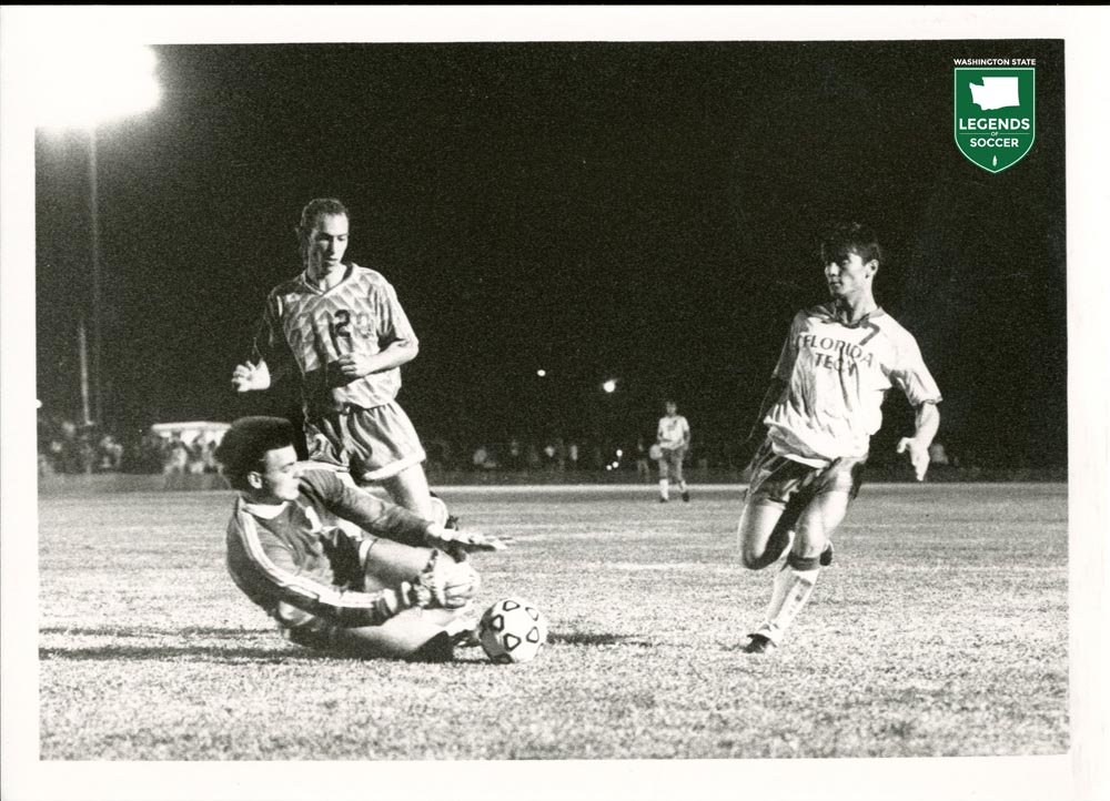Marcus Hahnemann of Seattle Pacific covers a loose ball before a Florida Tech player during a 1990 NCAA Division II semifinal. The Falcons' Brian Meier looks on. (Courtesy Seattle Pacific archives)