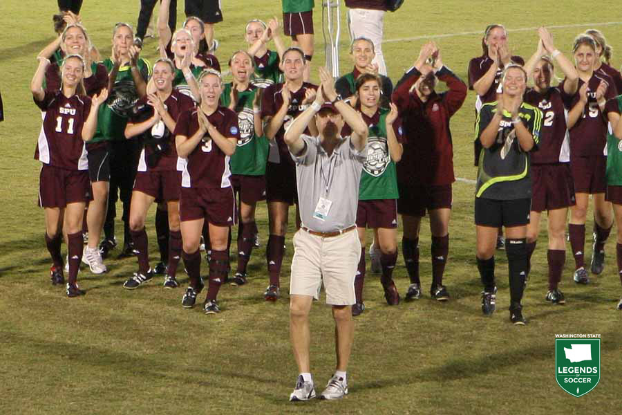Seattle Pacific coach Chuck Sekyra and his players salute the parents and fans who traveled to Tampa to support their NCAA championship run. (Courtesy Seattle Pacific)