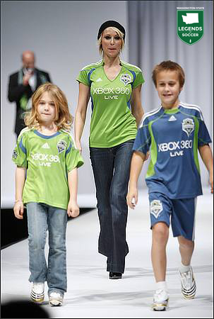 Actor Josie Bissett models the first Sounders home jersey at the WaMu Theater unveiling. (Courtesy Seattle P-I)