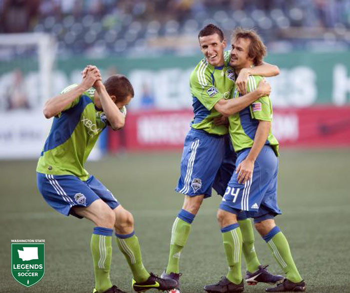 An iconic celebration, Nata Jaqua chops down Roger Levesque – scorer of the U.S. Open Cup opener at Portland – as Sebastien Le Toux looks on. (Sounders FC photo)