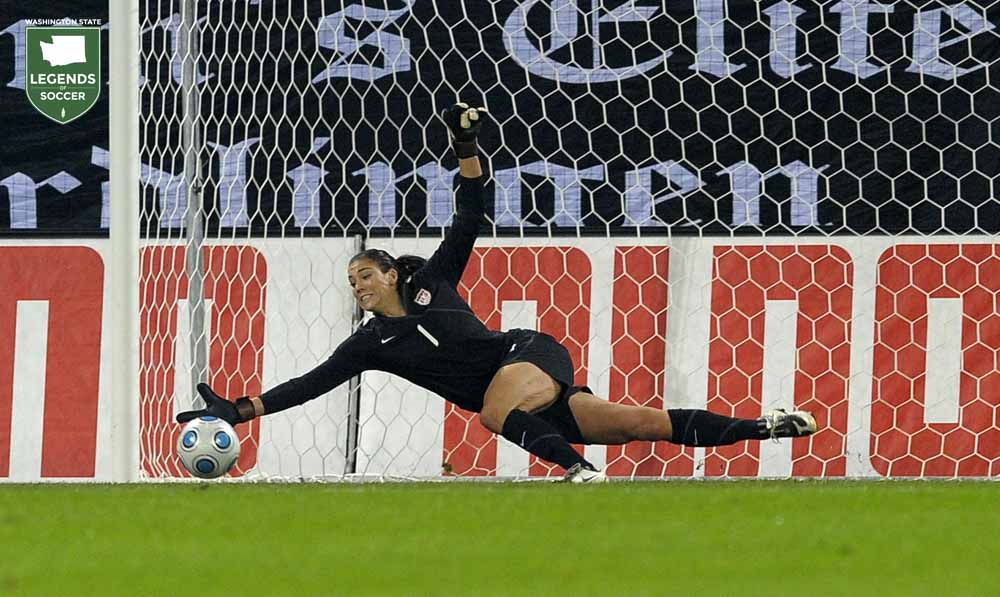 Hope Solo goes low to thwart Germany in the United States' 1-0 victory over the reigning World Cup champions in Augsburg, Germany. (Courtesy M.i.S./Renate Reimann / ISI Photos)