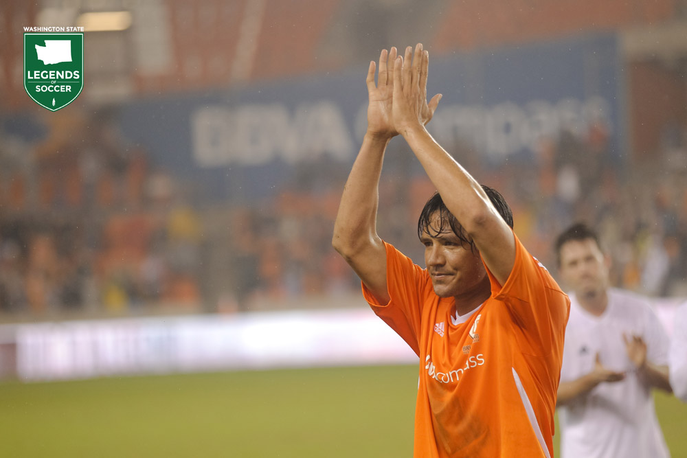 Former Gonzaga and Sounders forward Brian Ching applauds fans at his testimonial match in Houston. (Courtesy Houston Dynamo)