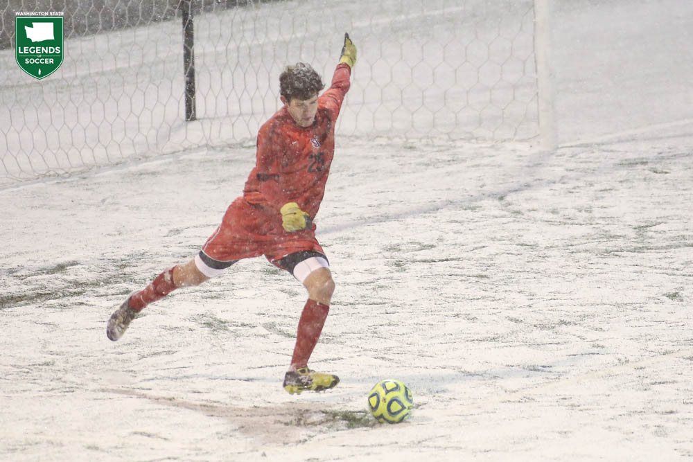 Seattle University Keeper Jake Feener launches a goal kick in the snow at Creighton. The Redhawks scored a 2-1 upset in their NCAA Division I tournament debut at Omaha. (Courtesy Seattle University Athletics)