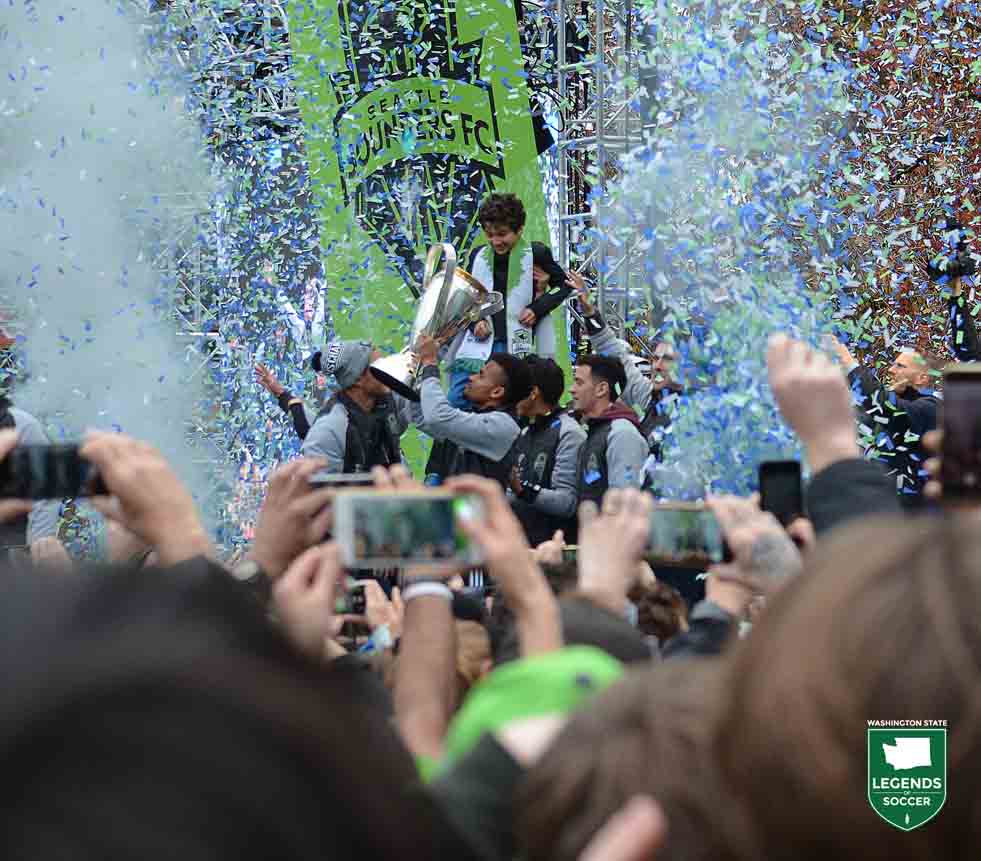 Confetti shoots skyward as the Sounders raise the Philip F. Anschutz Trophy before thousands of adoring fans at Seattle Center. (Courtesy Leann Johnson)