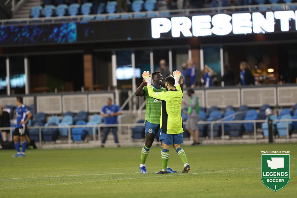 Yeimar congratulates emergency keeper Alex Roldan for his stoppage-time save to preserve a Sounders win at San Jose. (ISI Photos/Sounders FC)