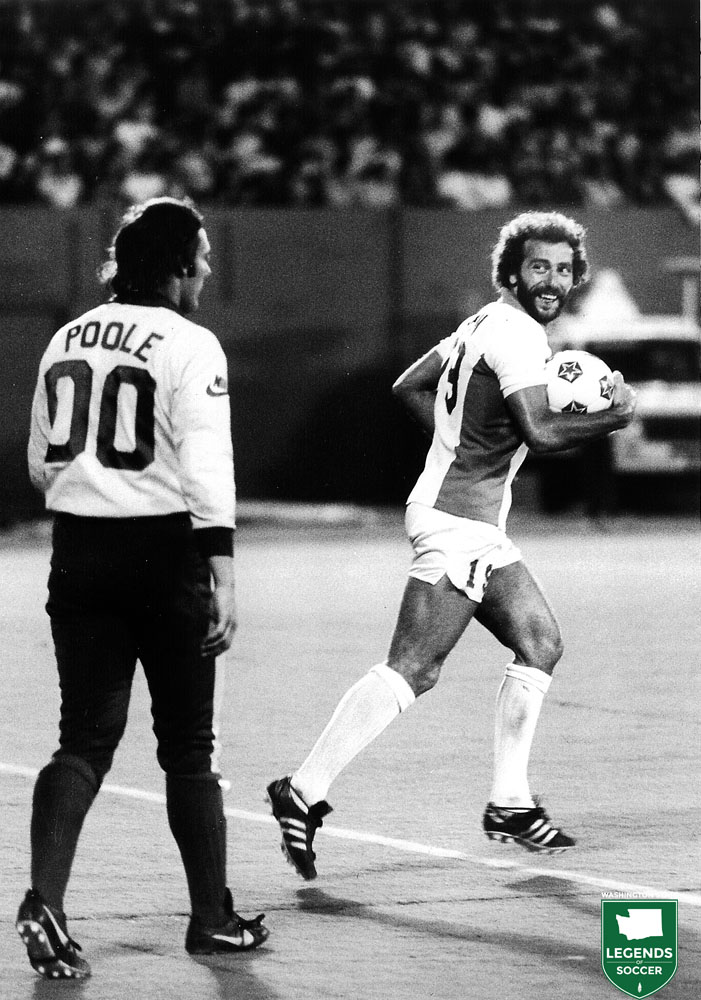 Sounders midfielder Frank Barton flashes a smile at Portland keeper Mick Poole after a Seattle goal. (Frank MacDonald Collection)