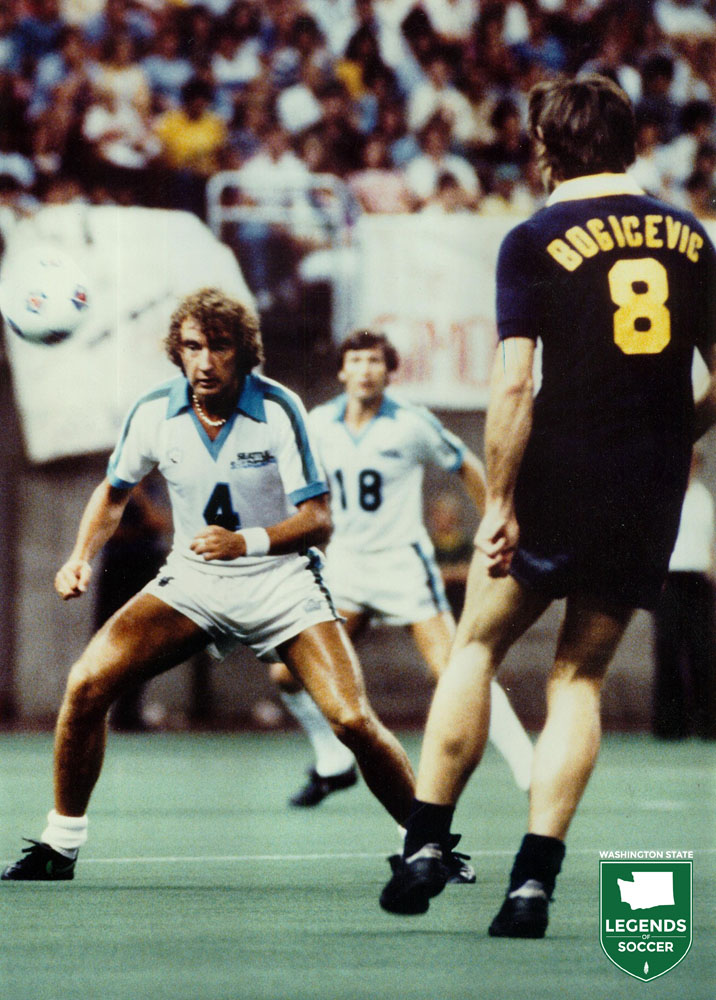 Alan Hudson and Vladislav Bogicevic face-off in the Sounders-Cosmos match before nearly 50,000 in the Kingdome. (Courtesy NASL Jerseys)