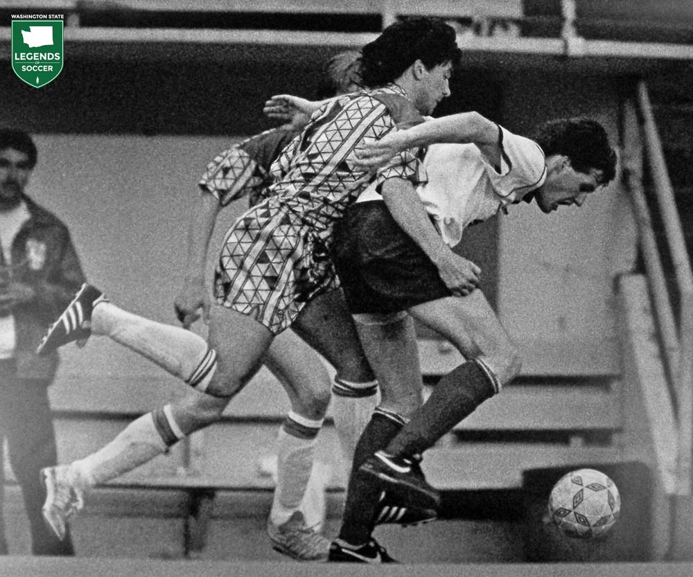 Chance Fry of FC Seattle wards off a Dnepr defender during the 1990 exhibition at Memorial Stadium. (Frank MacDonald Collection)